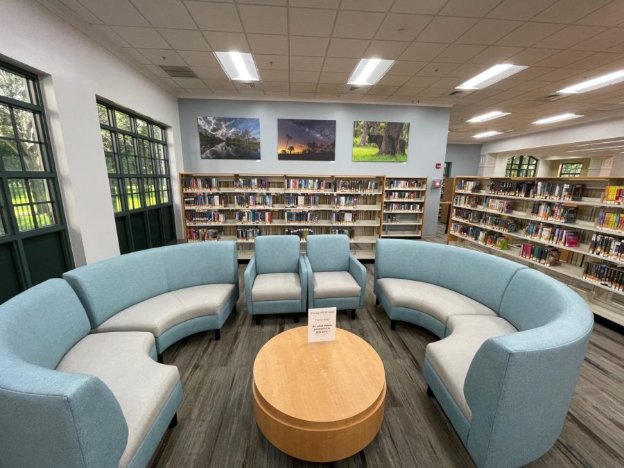 Young+Adult+novels%2C+comfortable+seating%2C+and+desks+meant+for+studying+can+all+be+found+within+the+Parkland+Public+Librarys+teen+section.+These+items+were+instituted+to+give+teens+a+reason+to+visit+the+library%2C+utilize+its+resources%2C+and+participate+in+its+programs%2C+for+their+benefit.