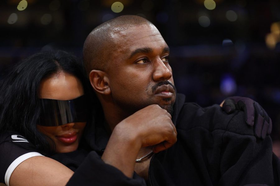 Rapper Kanye West and girlfriend Chaney Jones attend a game between the Washington Wizards and the Los Angeles Lakers at crypto.com Arena on March 11, 2022, in Los Angeles. Photo courtesy of Ronald Martinez/TNS.