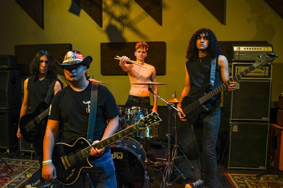 Jam Session. Chained Saint practices their heavy metal music as a newly started band. The band consists of vocalist Michael Sorensen, bass guitarist Ethan Kahn, drummer Cameron Cottrell, and bass guitarist Sebastian De Avila. Photo courtesy of Chained Saint.