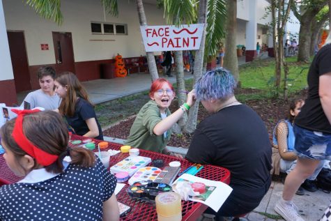 There were different activities set up for students to go to, one being face painting. Others were a cake walk, haunted maze and trunk or treat.