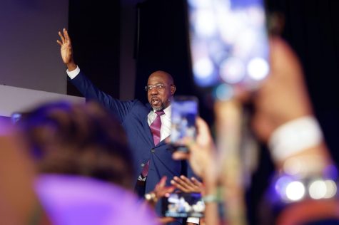 U.S. Sen. Raphael Warnock waves at supporters after winning the senate runoff election on Dec. 6, 2022. Photo courtesy of Natrice Miller/AJC/TNS.