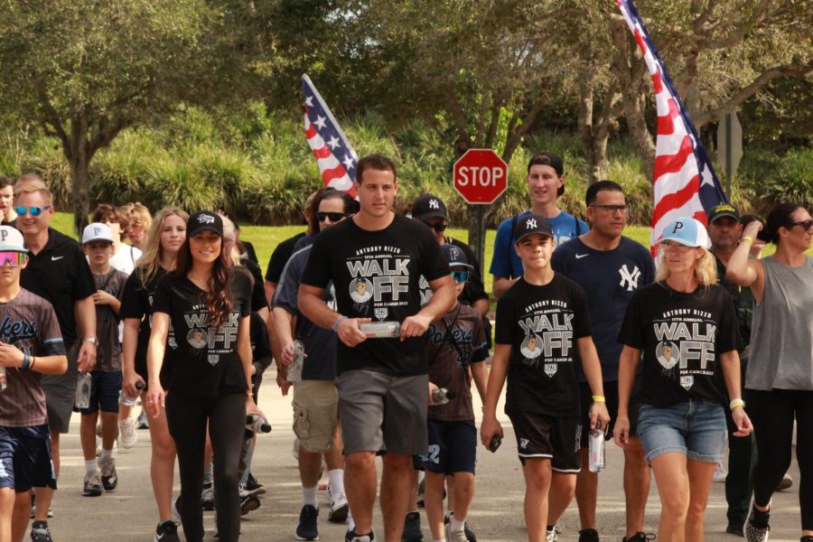 Anthony Rizzo, his wife Emily Vakos and others near the finish line of the race. Rizzo and his family founded the Anthony Rizzo Family Foundation in 2012 and has held the walk every year since.