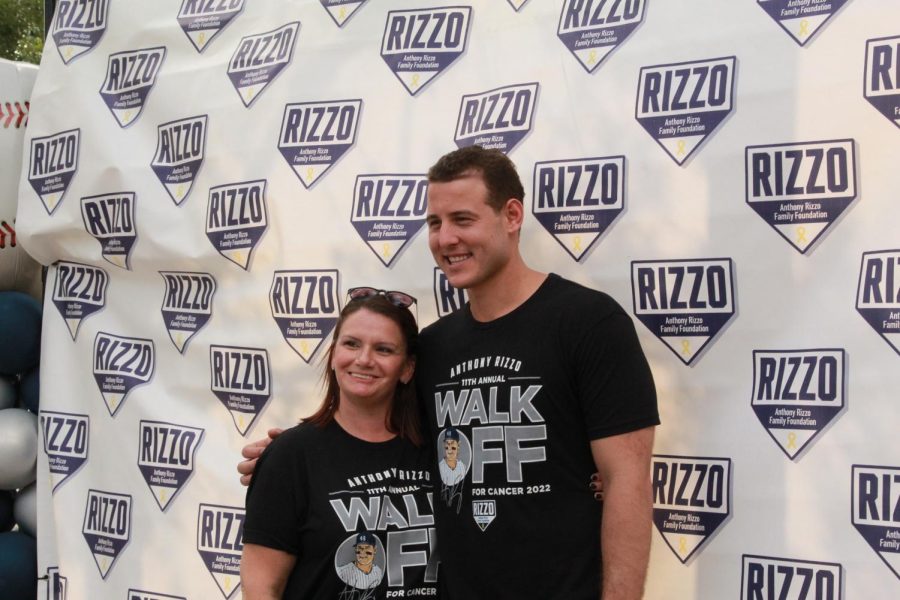 Anothony Rizzo poses with walk participant. After the walk ended Rizzo took photos with participants and thanked them for joining the event.