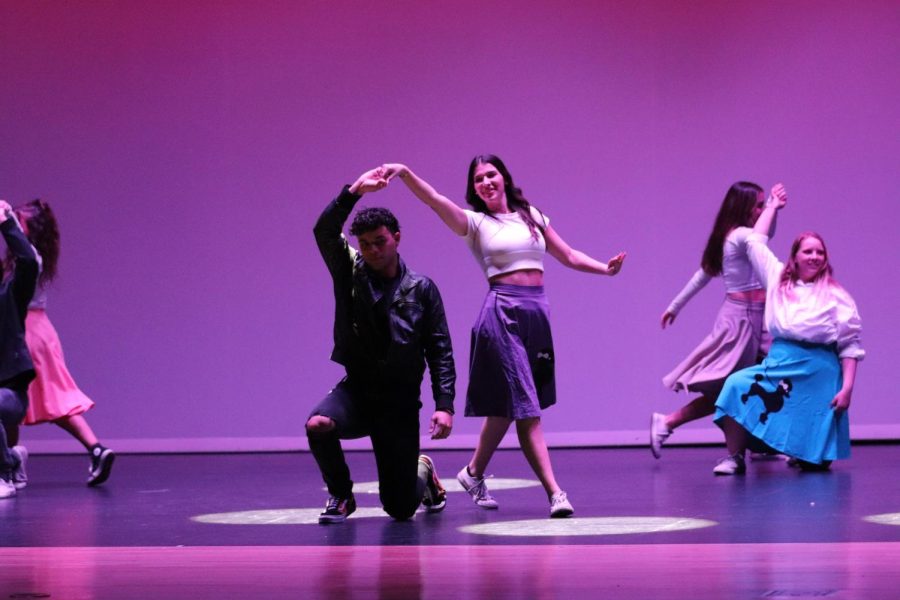 Student performers danced through the decades, characterized by the change in clothing and music. One segment was the 1950s, where bright poodle skirts dominated the time period.