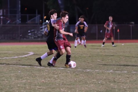 Defender Robbie Alhadeff (8) drives the ball in a match against the South Plantation Paladins. Alhadeff scored one goal in this game, contributing to a 5-0 victory.
