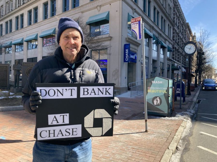 Russ Vernon-Jones and other climate activists protested March 7, 2022, outside Springfields new Chase Bank location on Main Street. Photo permission from Will Katcher/MassLive/TNS.