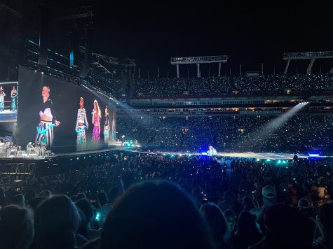 Pop superstar Taylor Swift performs Blank Space during the 1989 portion of Tampa Day 2 of The Eras Tour, which showcases songs from each album. LED bracelets handed out to concert-goers at the entrance illuminate the crowd and change color according to the different songs of each era.