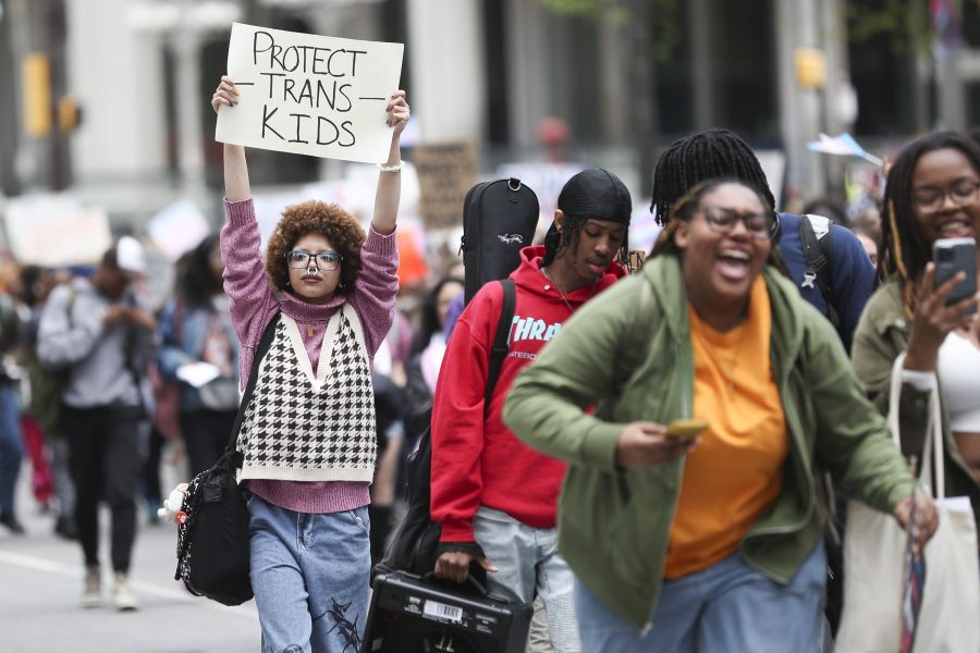 Students, including Mckenzie Wright, left, marched toward Philadelphia's City Hall as they walked out of school to protest anti-trans legislation on Tuesday. Photo permission from Heather Khalifa/TNS.