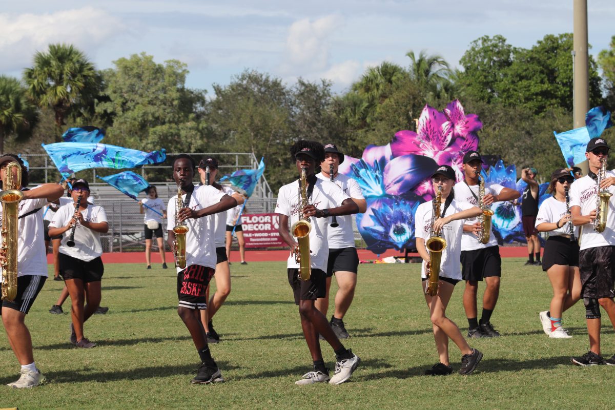 Marjory Stoneman Douglas High Schools Eagle Regiment practices on Cumber Stadiums field for their Bands of America competition in Orlando. The band practices until 7 p.m. on most school days, which makes it challenging to balance schoolwork.