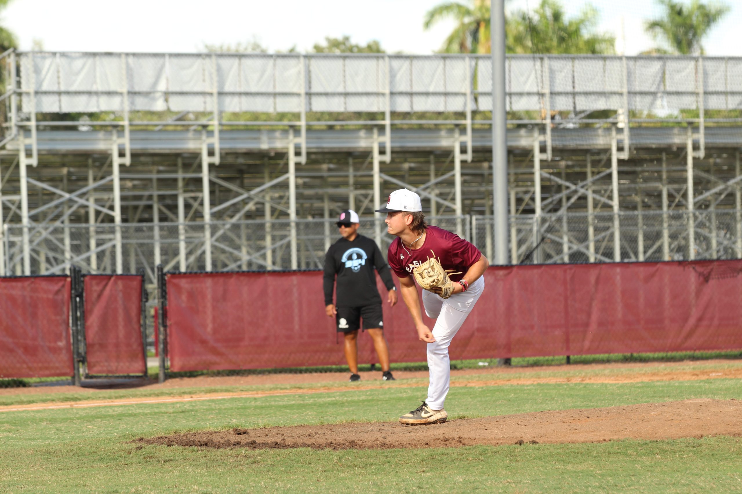Pitcher and second basemen Brayden McCluskey (5) pitches to the opposing team during the fall season of 2022. Today, the senior celebrates commitment to Hillsborough Community College where he will be furthering his athletic and academic career.
