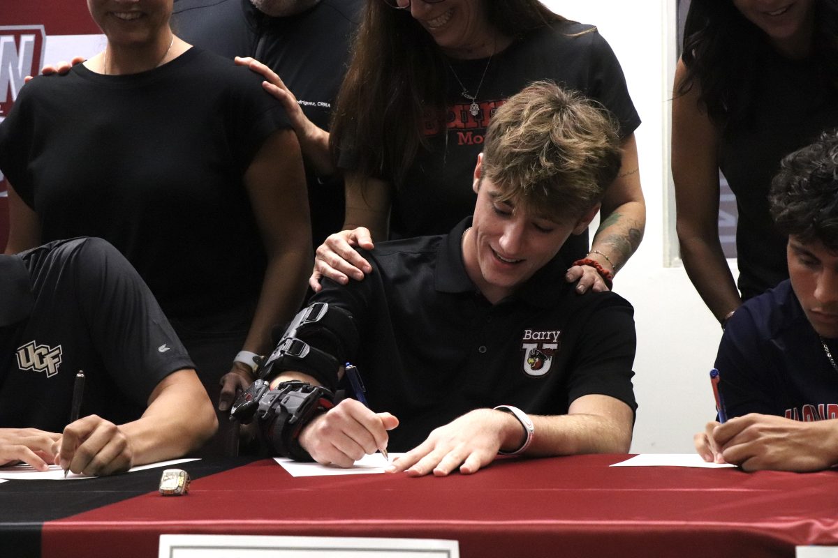 Pitcher James Smith signs his official commitment with Barry University on Nov. 15. Smith will be furthering his baseball career at the collegiate level starting in the fall of 2024.