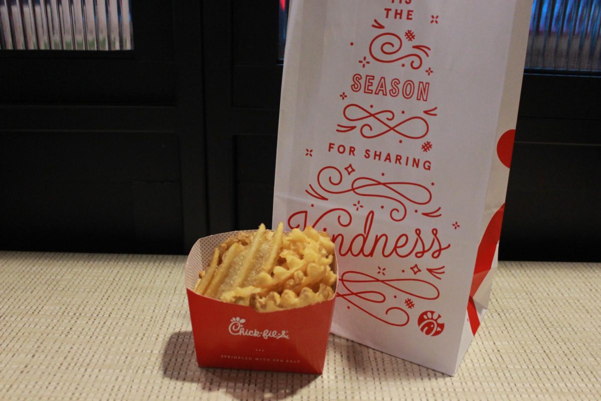 Waffle fries at Chick-Fila-A are served with a thick layer of coarse sea salt flakes. Employees hand-deliver the fries with a warm smile.