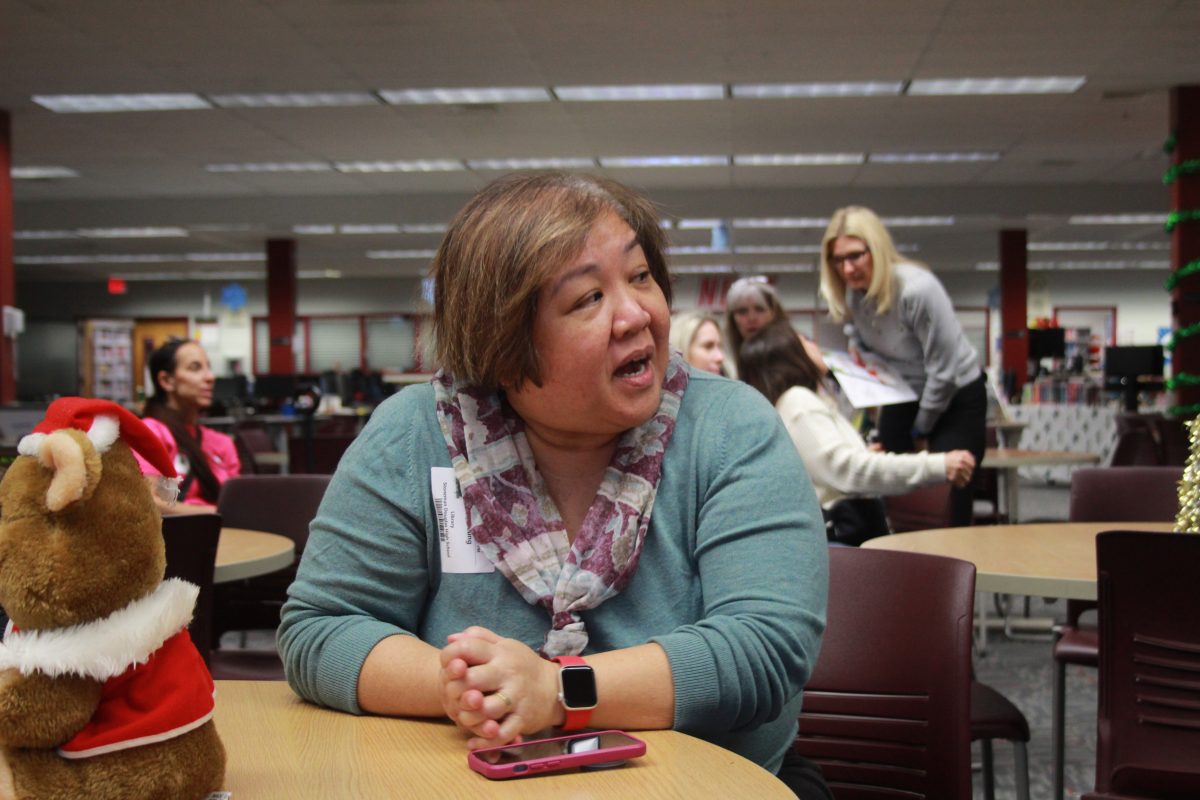 SAF co-chair Becky Leung discusses PSD waiver form procedures at the Dec. 6 meeting. The board met at the SAC meeting where topics such as graduation, the new AICE program, and midterm week were covered.