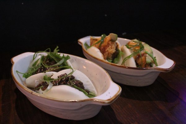 Kubo Asian Fusion customers can enjoy Beef Bulgogi or Chicken Tempura Bao Buns for $10.95 a plate. The dishes feature a fluffy bao bun with beef or chicken stuffed in the middle, topped with a sprinkle of scallions.