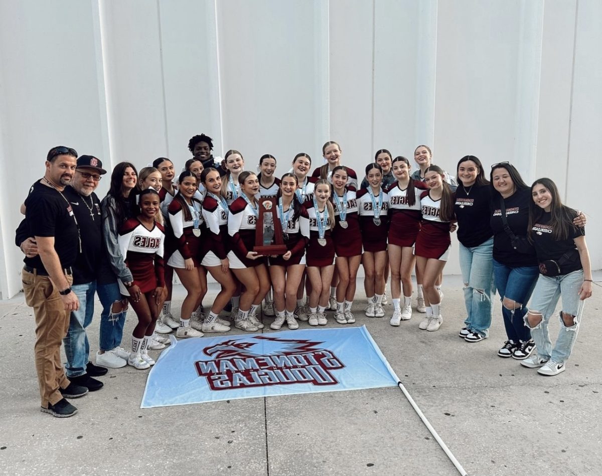 MSD’s competitive cheer team poses with coaches and staff after receiving their second place win at the 2024 FHSAA State Championships. The competition was held on Feb. 2 in Lakeland, Florida. Photo permission from MSD Cheerleading.