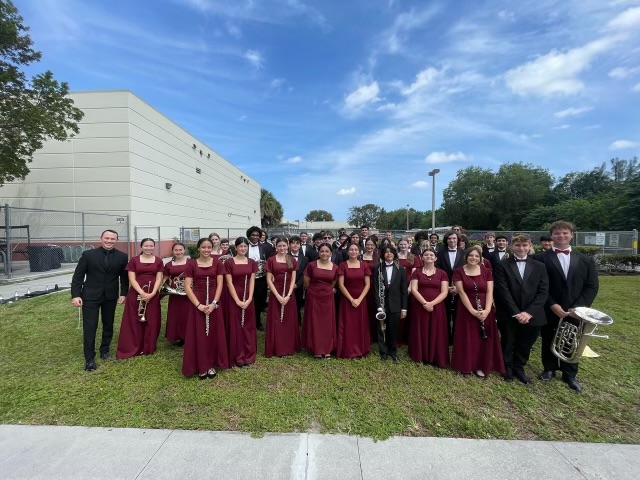 After completing their band evaluation, Symphonic Winds members pose for a picture. Band evaluations took place on March 13 at Monarch High School where members presented three songs and did a sight reading. Photo permission from Garret Sullivan and MSD Band.