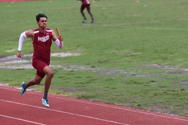 Senior Krish Sule runs the second leg of the mens 4x100 relay. Sule won 2nd place with the time of 43.34, and the relay took place at South Plantation High School on Feb. 27.