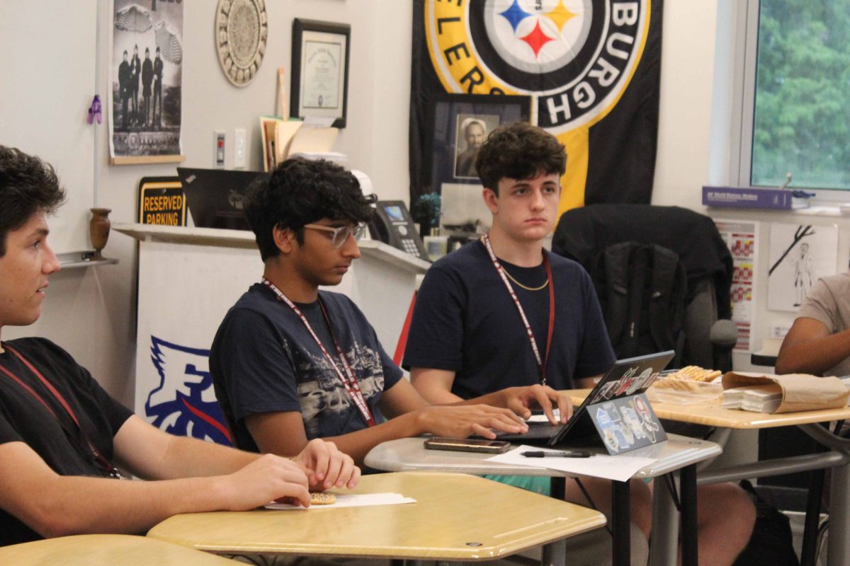 Vice Presidents Colin Crippen and Sidd Ojha lead the discussion at the first Politics Club meeting. The conversation revolved around social media and media bias.