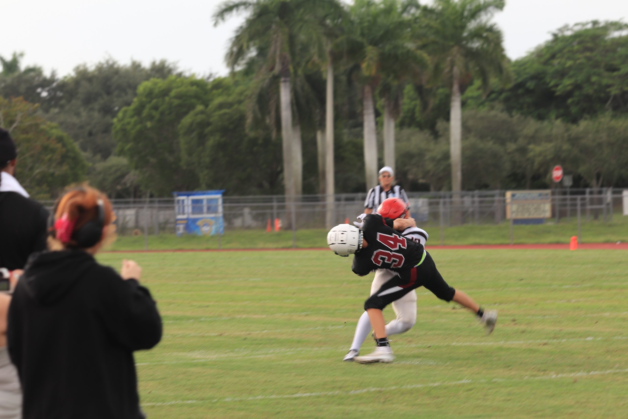 Defensive Back Ra'Cari Dorsainvill (34) makes the effort to come up with a tackle on the play. MSD held the opposing team to zero first quarter points.