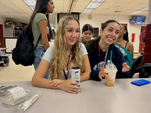 Sophomores Isabella Valentine and Lilah Shane fuel up with caffeine before class. These students drank their favorite caffeinated beverages in the hopes of receiving an energy boost before a long day of school.  ''Every morning I wake up exhausted and need a quick boost before class," Valentine said.