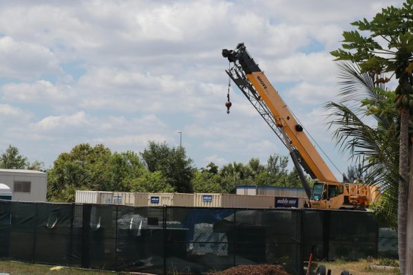 
Craning Up. A crane sits into a construction staging areas behind Marjory’s Garden. Construction vehicles and equipment were stationed here for use by contracted workers for the duration of the various construction projects. 