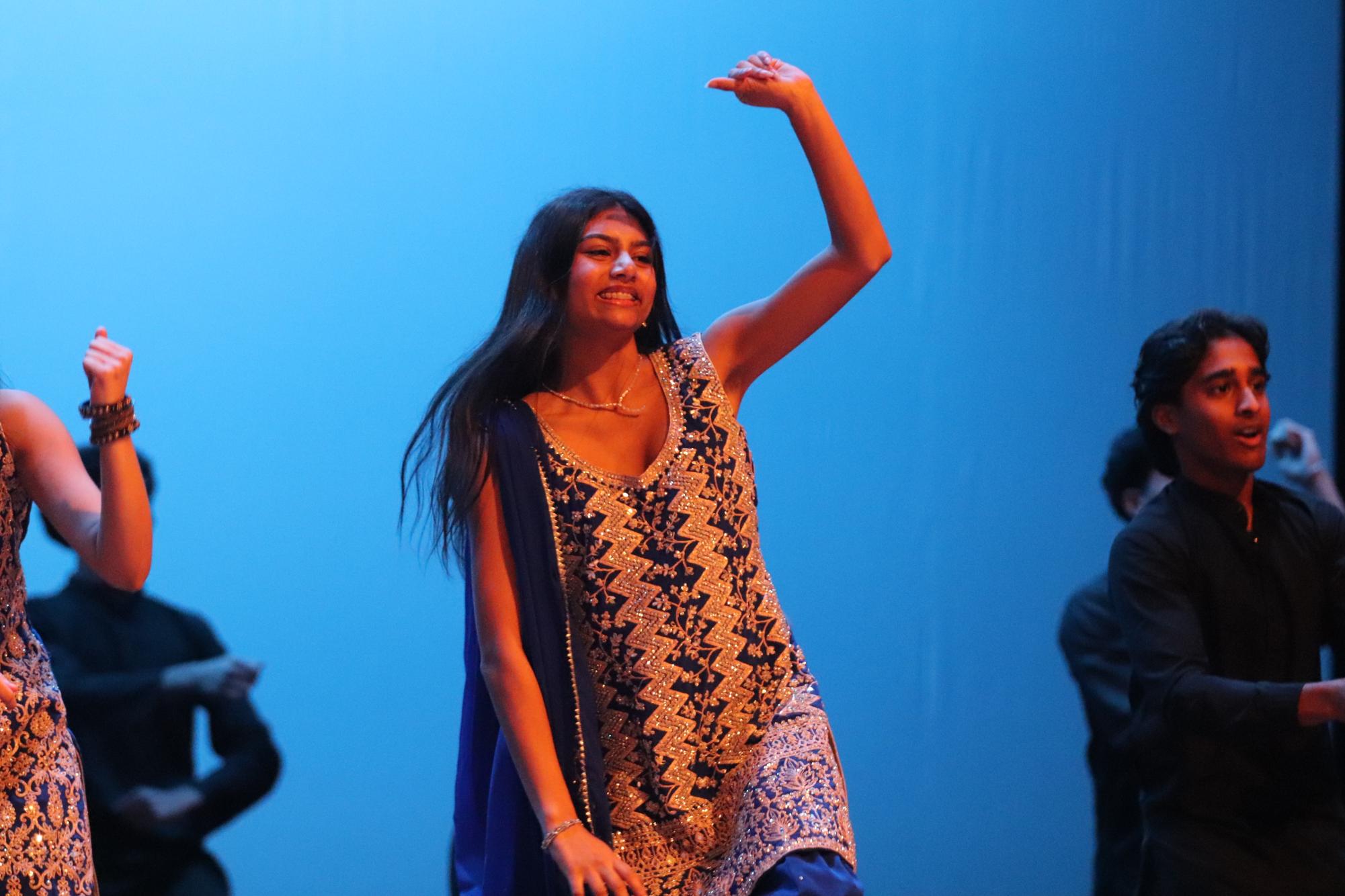 Junior Alyssa Ali dances during the Bollywood act of the show. Ali choreographed Bollywood this year.