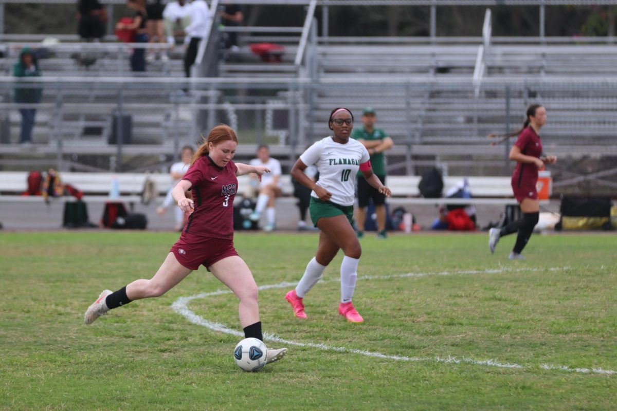 Cleared. Center back Olivia DeStefano (3) clears the ball against Flanagan High School on Mon., Jan. 12. It was Senior Night and the seniors on the girls varsity soccer team were honored for their contributions and dedication. 