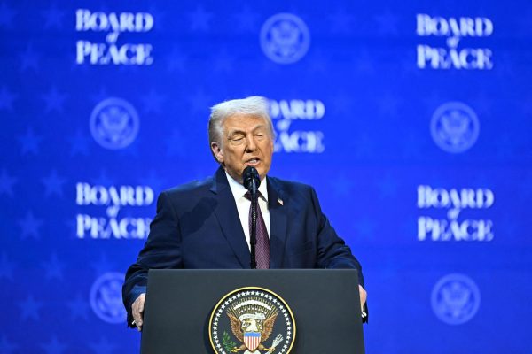 President Donald Trump speaks at the Board of Peace meeting during the World Economic Forum (WEF) annual meeting in Davos on Jan. 22. Originally meant to oversee the rebuilding of Gaza, the board's charter does not limit its role to the Strip, and has sparked concerns that Trump wants it to rival the United Nations. Photo permission from Fabrice Coffrini/AFP/Getty Images/TNS.