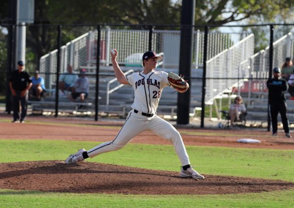 Pitch Perfect. Pitcher Reid Dadic (28) fires a pitch against Coral Glades High School on Tues., March 31. The game took place at Anthony Rizzo Field at 6 p.m., where Dadic allowed zero runs with a pair of strikeouts while also going 2 for 2 with an RBI in the men's varsity baseball team's 12-0 victory. "Whether I’m at the plate or on the mound my focus is to help the team win," Dadic said. "It’s makes my day on the mound easier when the team’s bats are hot."